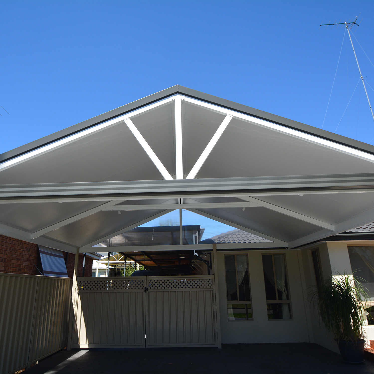 diy freestanding flat roof carport with gable roof design.