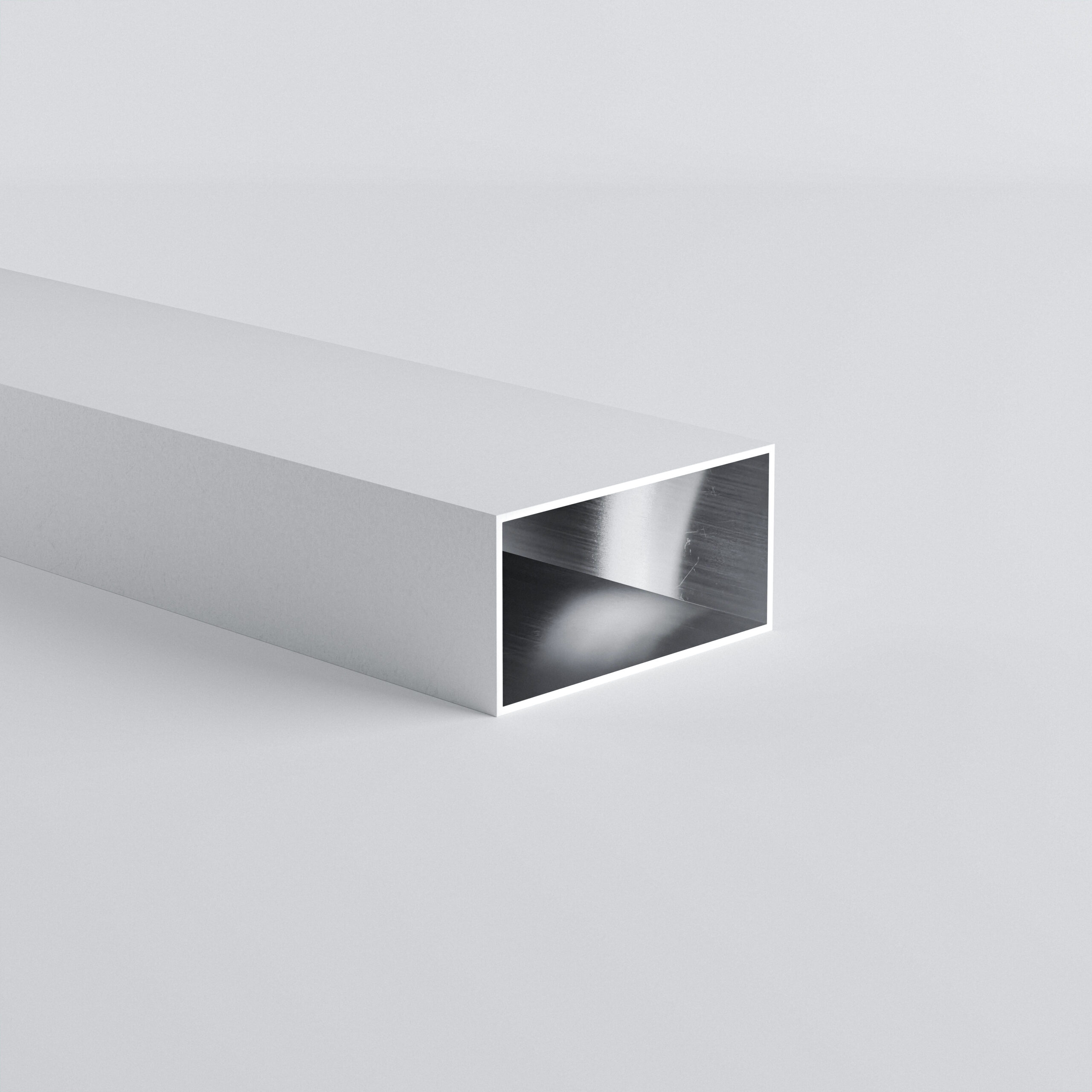 White rectangular metal tube on grey background